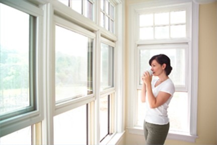 Image of a Woman admiring her Clean Windows Perth